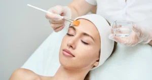 Woman receiving VI Peel facial treatment at a spa in Indianapolis, IN